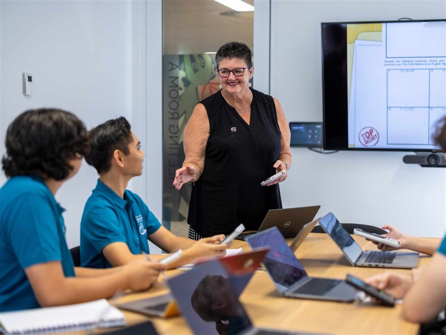 FisherONE Maths Teacher assisting students