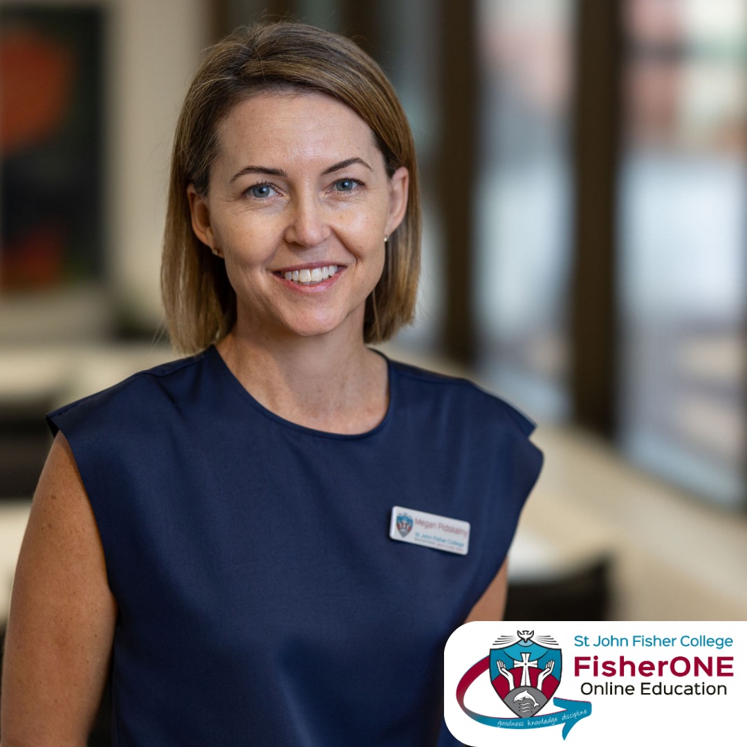 Staff member portrait against a blurred indoor background.