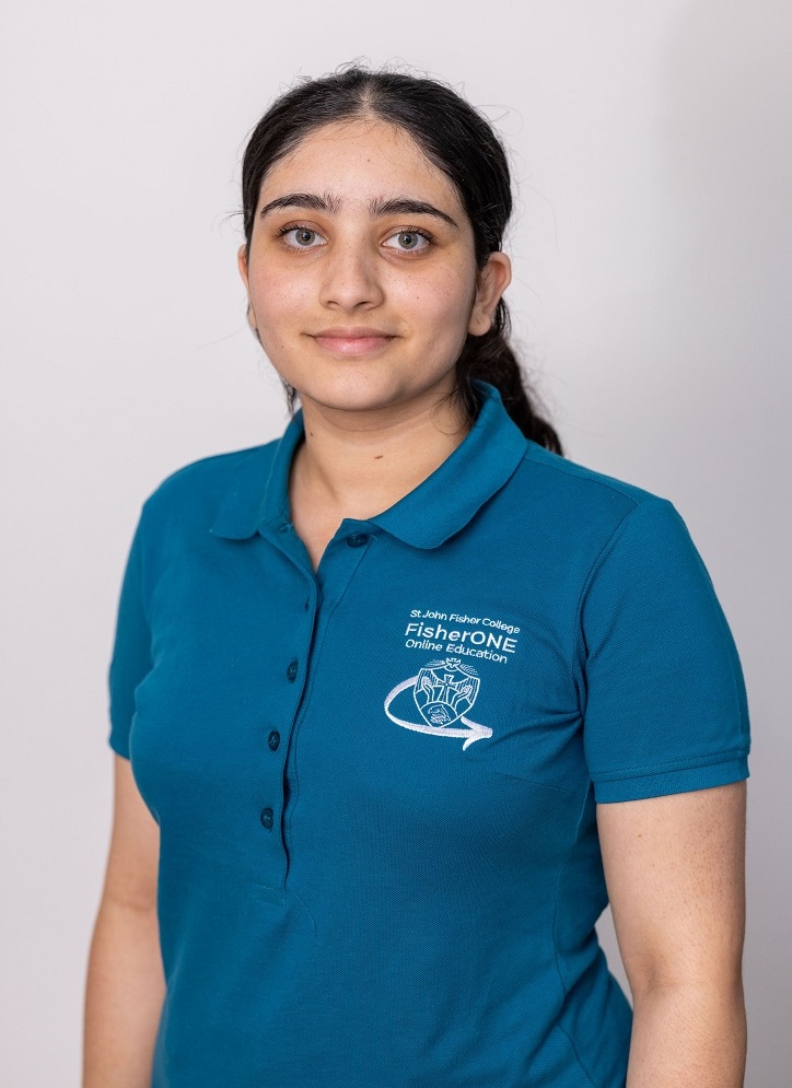 Student wearing a school uniform top standing against a plain background.
